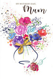 This Mother's Day card presents a dreamy watercolour bouquet that feels both artistic and comfortingly familiar, as though inspired by arrangements regularly crafted at Ruislip Florist. At the bottom of the design sits a modest vase, defined by a few graceful strokes of deep indigo that quickly soften into the white card, so its form feels light and unobtrusive. From this base spills an exuberant mix of blooms: strong cerise and vivid pink blossoms dominate the centre, with rounded, rose-like shapes layered in translucent washes of colour. Around them, softer tones of blush, peach, and gentle coral mingle seamlessly, evoking the warmth of a spring afternoon spent with family in nearby parks. Cooler accents of indigo, soft blue, and lavender weave subtly between the warmer shades, adding depth and balance, much like the patches of shadow under trees in Ruislip Woods. Hints of fresh green peek through in slender, suggestive strokes that imply leaves and stems without rigid structure. The background remains mostly white, but it is animated by joyful splatters of colour and scattered heart motifs, like confetti caught mid-air over a Mother's Day brunch table. Delicate touches of gold paint skim over some petals and the rim of the vase, lending a refined shimmer recalling late-day sunlight on local shop windows along High Street. The overall composition is loose yet thoughtful, a painterly interpretation of a hand-tied bouquet that captures affection, gratitude, and the quiet happiness of telling Mum how much she is cherished.